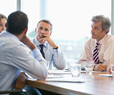 coworkers having a discussion in a meeting