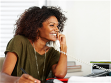 Image of a woman talking on a telephone