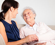 young woman is taking care of old woman