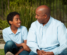 father is talking to his son